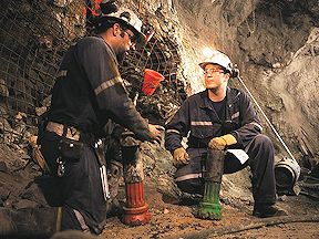 Miners working inside a mine