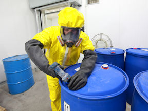 Worker working with hazardous chemicals