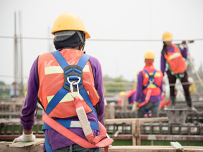 Worker working safely at heights after completing WHSC training