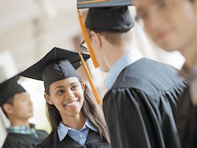 Students celebrate after graduation