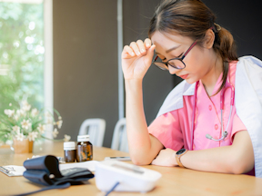 Woman feeling stress at work