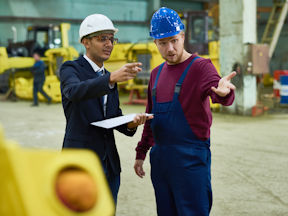 Supportive supervisor helping prevent worker injury