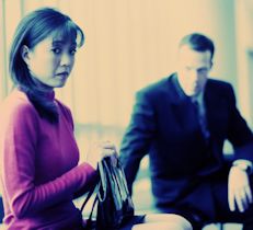 Female worker facing harassment from a male colleague