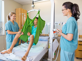 Nurses handling patient safely