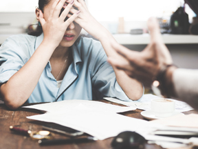 Female worker facing harassment from a male colleague