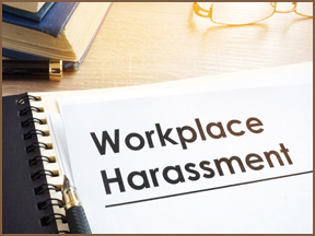 Notebook that says 'Workplace Harassment' on it