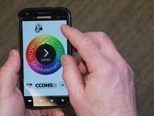 Worker using the Measure Workplace Stress App designed by the Occupational Health Clinics for Ontario Workers