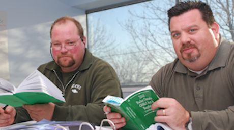 Two Guys with Green WHSC Books